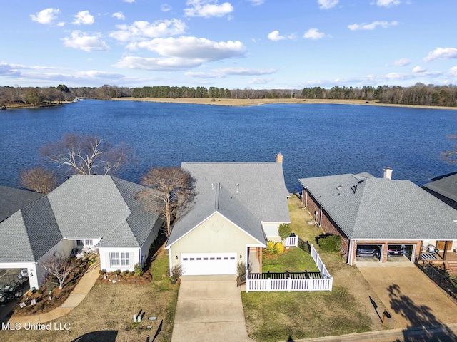 drone / aerial view with a water view