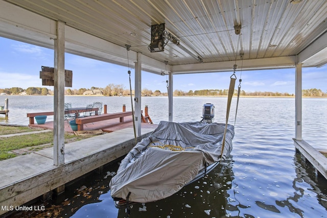 dock area featuring a water view