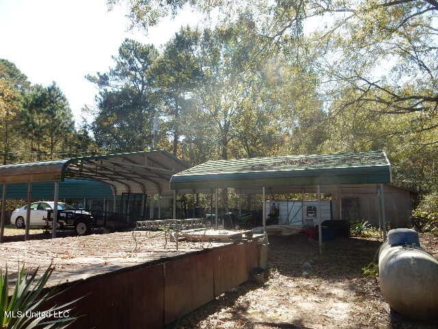 view of yard with a carport