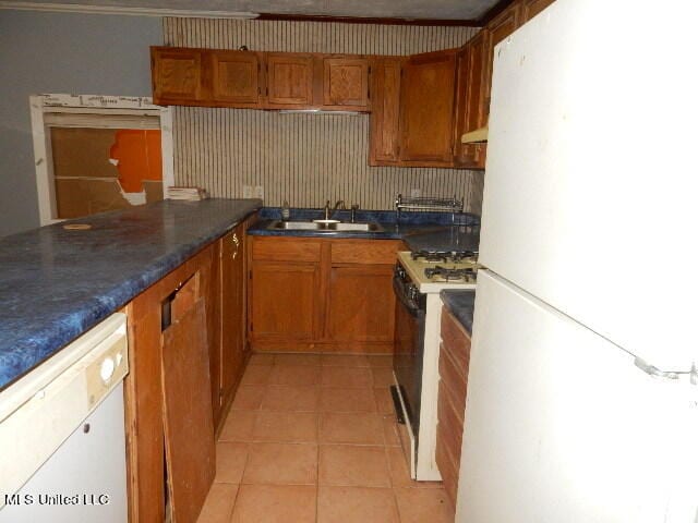 kitchen with crown molding, sink, exhaust hood, and white appliances