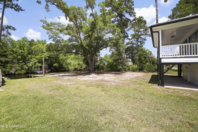 5061 1st Ave, Bay Saint Louis, MS 39520 - view of green lawn featuring a water view