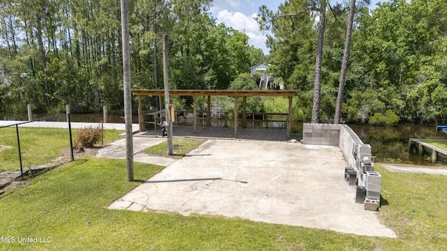 5061 1st Ave, Bay Saint Louis, MS 39520 - view of home's community featuring view of scattered trees and a deck with water view
