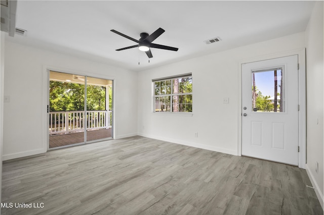 5061 1st Ave, Bay Saint Louis, MS 39520 - unfurnished room with wood finished floors, baseboards, and a ceiling fan