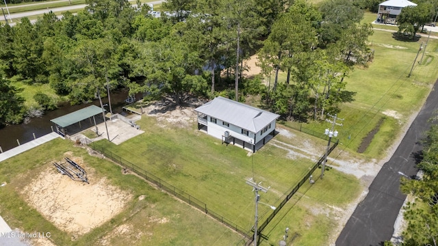 5061 1st Ave, Bay Saint Louis, MS 39520 - view from above of property featuring a tree filled landscape