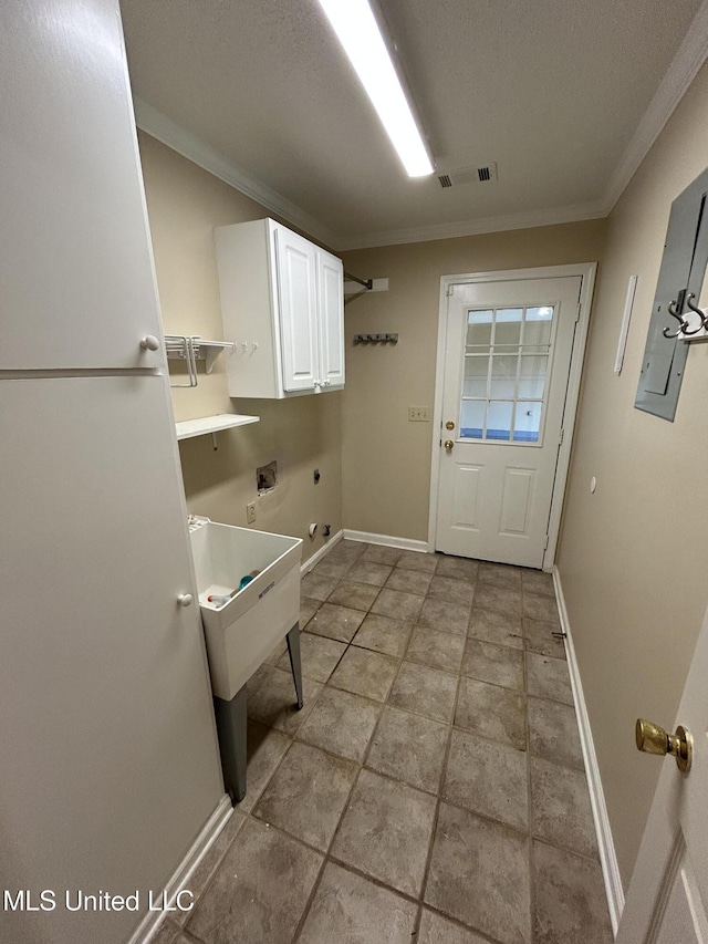 1171 S Bayou Rd, Boyle, MS 38730 - laundry area featuring cabinet space, ornamental molding, washer hookup, hookup for an electric dryer, and electric panel