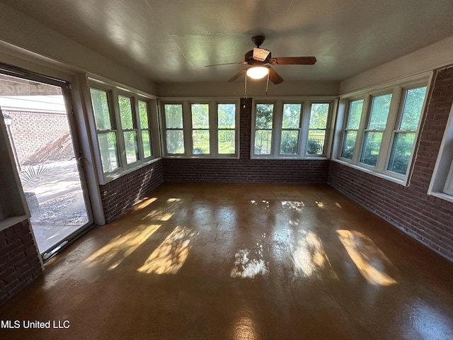 1171 S Bayou Rd, Boyle, MS 38730 - unfurnished sunroom featuring brick wall and wood finished floors