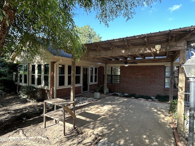 1171 S Bayou Rd, Boyle, MS 38730 - back of house with a pergola, brick siding, ceiling fan, and a patio