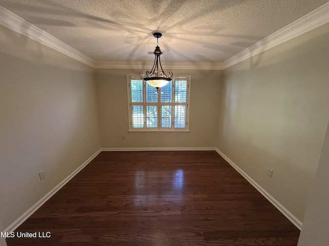 1171 S Bayou Rd, Boyle, MS 38730 - spare room with dark wood-style flooring, a textured ceiling, and crown molding
