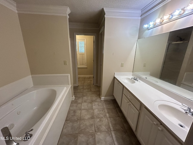 1171 S Bayou Rd, Boyle, MS 38730 - bathroom with a tub with jets, double vanity, a textured ceiling, a shower stall, and tile patterned floors
