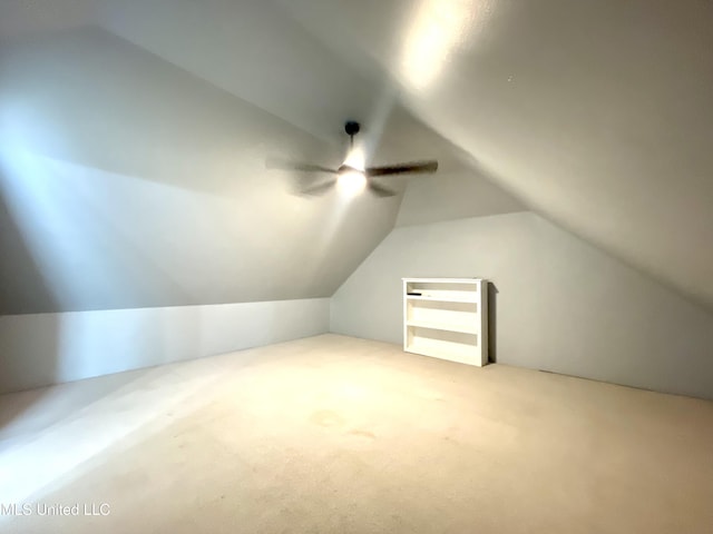 bonus room featuring carpet floors, ceiling fan, and lofted ceiling
