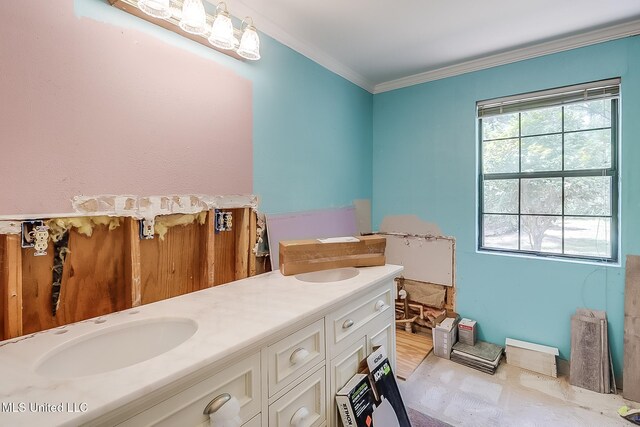 146 Maple Dr, Perkinston, MS 39573 - bathroom with crown molding and double vanity
