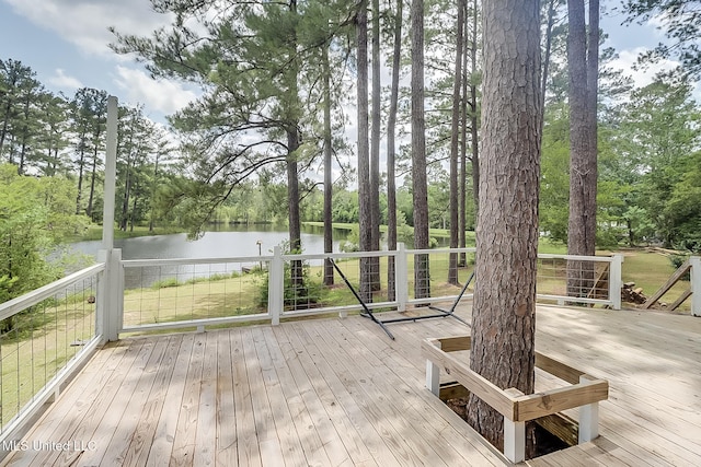 146 Maple Dr, Perkinston, MS 39573 - wooden deck featuring a water view and view of scattered trees