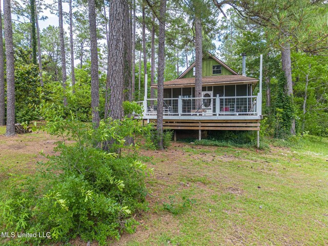 146 Maple Dr, Perkinston, MS 39573 - back of house with a sunroom