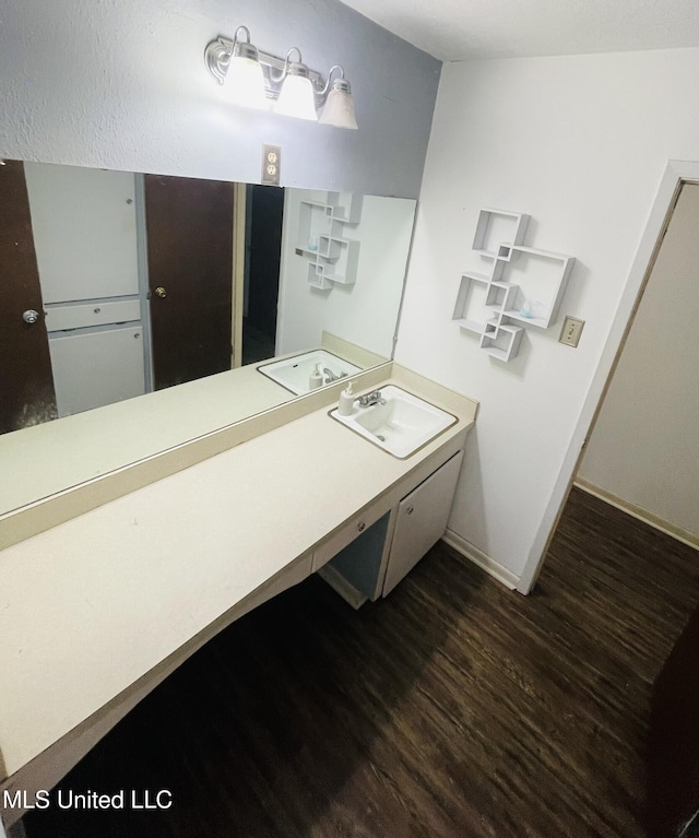111 Brookfield Dr, Natchez, MS 39120 - bathroom featuring wood finished floors, vanity, and baseboards