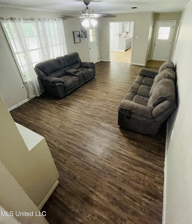 111 Brookfield Dr, Natchez, MS 39120 - living room with dark wood-style floors, ceiling fan, and baseboards