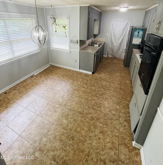 111 Brookfield Dr, Natchez, MS 39120 - kitchen with black oven, a sink, ornamental molding, light countertops, and gray cabinetry