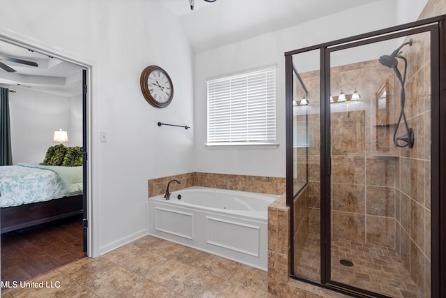 bathroom with separate shower and tub and ceiling fan