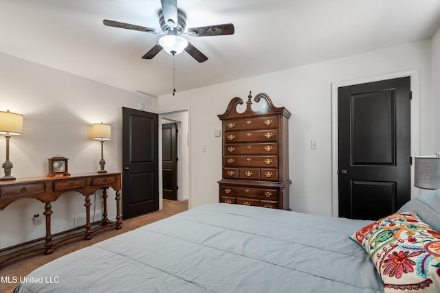 carpeted bedroom featuring ceiling fan