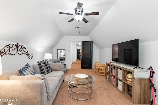 carpeted living room featuring vaulted ceiling and ceiling fan