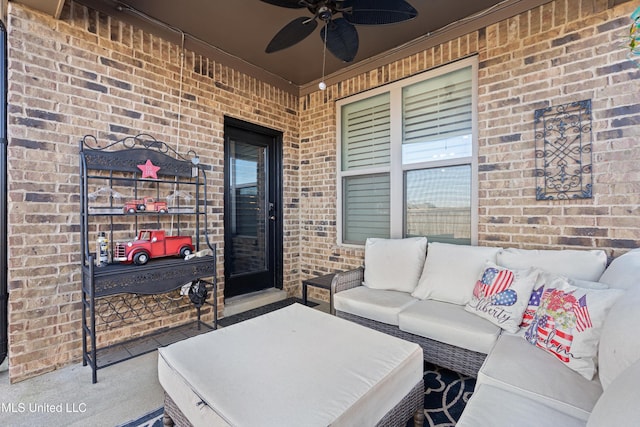 view of patio / terrace with an outdoor living space and ceiling fan