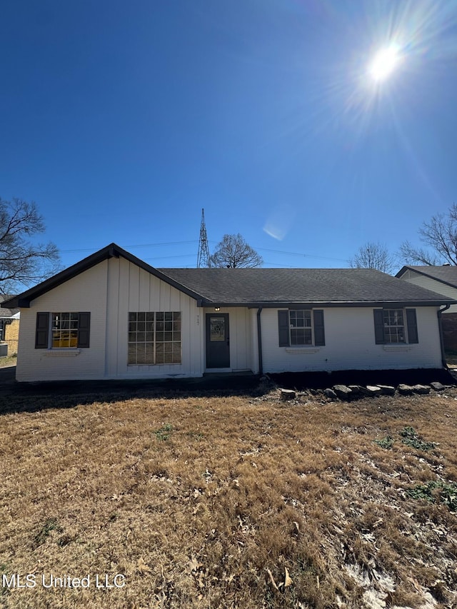 ranch-style home with board and batten siding