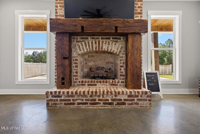 1254 Wade Patrick Rd, Brandon, MS 39042 - detailed view of baseboards, concrete floors, and ceiling fan