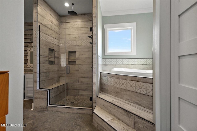 1254 Wade Patrick Rd, Brandon, MS 39042 - bathroom with a shower stall, a bath, and crown molding