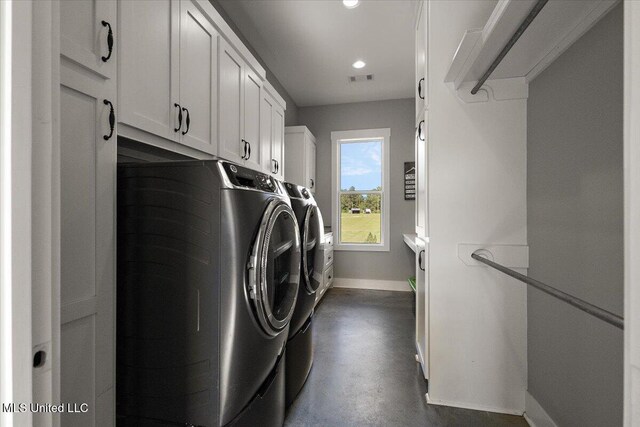 1254 Wade Patrick Rd, Brandon, MS 39042 - laundry room featuring washer and dryer, baseboards, cabinet space, and recessed lighting