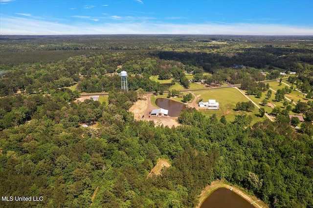1254 Wade Patrick Rd, Brandon, MS 39042 - aerial view of property and surrounding area with a heavily wooded area