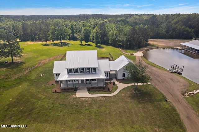 1254 Wade Patrick Rd, Brandon, MS 39042 - aerial view of property and surrounding area with a heavily wooded area and a large body of water