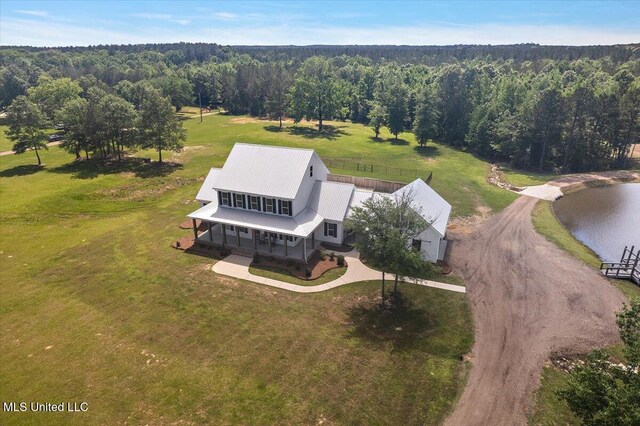 1254 Wade Patrick Rd, Brandon, MS 39042 - view from above of property with a heavily wooded area and a nearby body of water