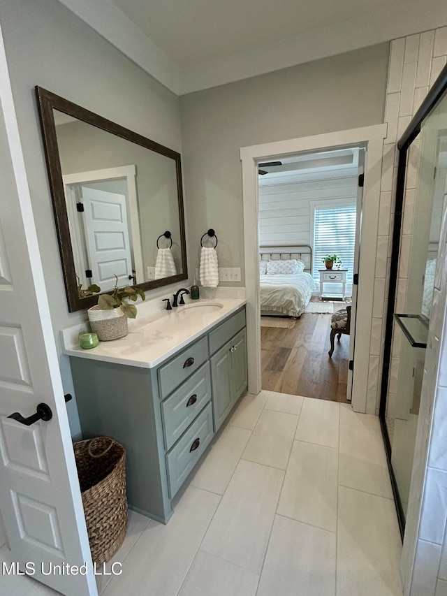 bathroom featuring vanity and tile patterned flooring