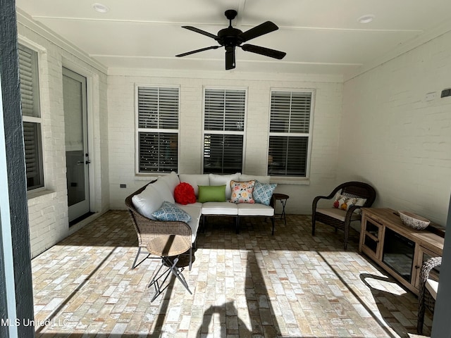 view of patio / terrace featuring an outdoor living space and ceiling fan