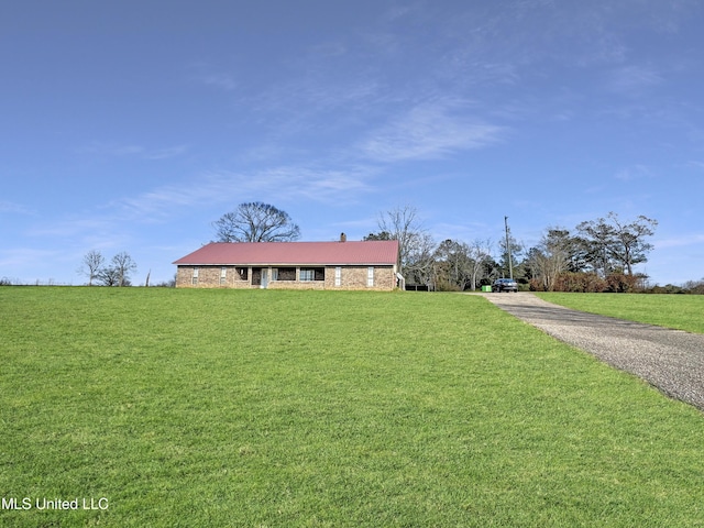 view of front of property with a front lawn