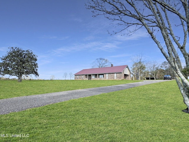 exterior space with a front yard