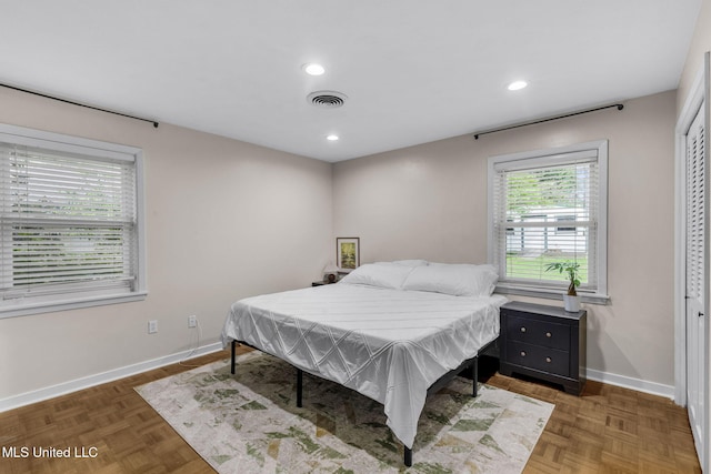 bedroom with recessed lighting, baseboards, and visible vents