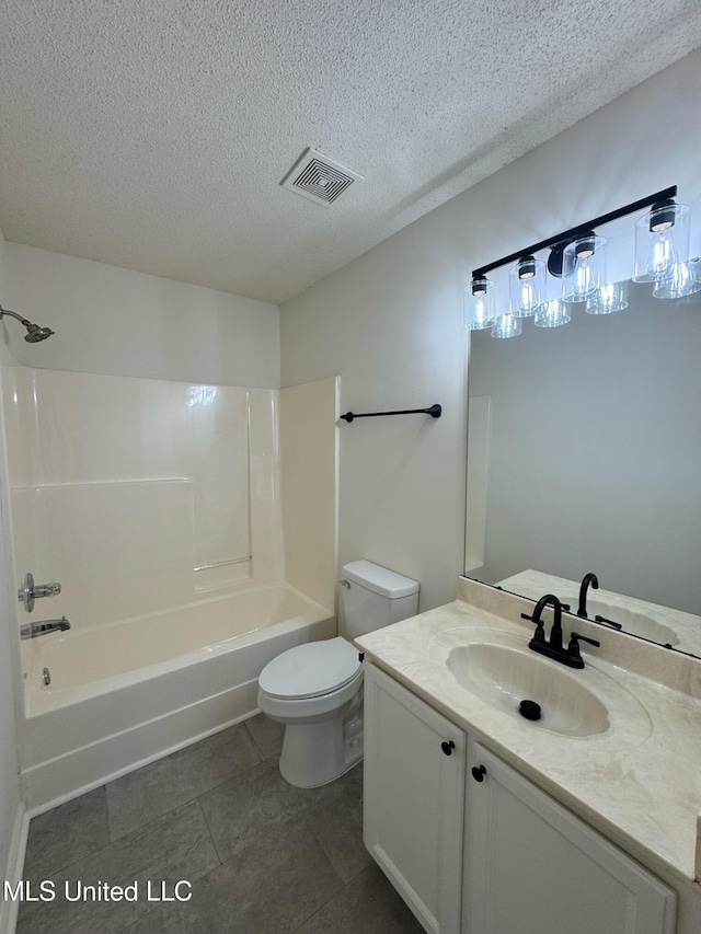 full bathroom with vanity, shower / bathtub combination, toilet, and a textured ceiling