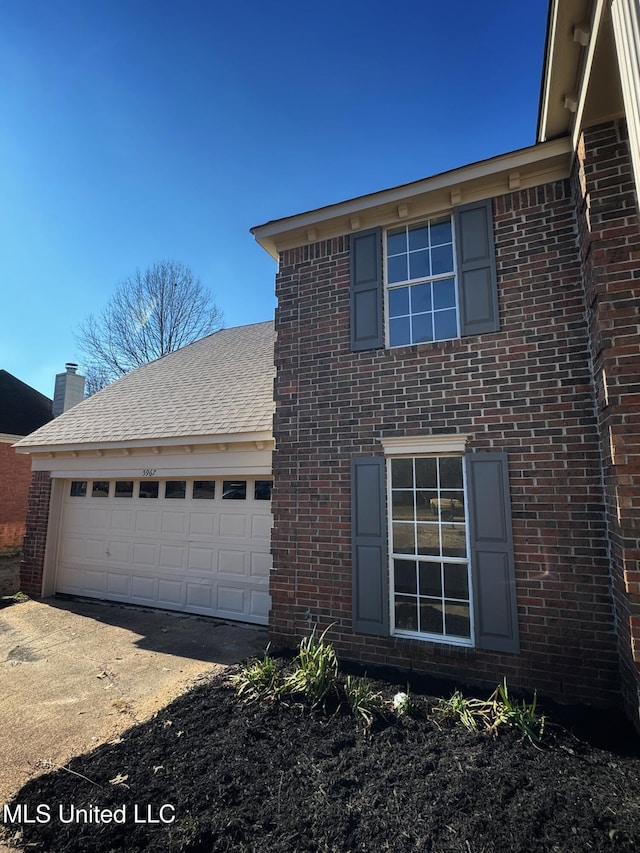 exterior space featuring a garage