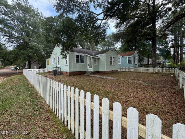 view of front of home featuring central air condition unit