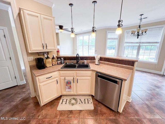 kitchen featuring crown molding, a sink, a peninsula, a wealth of natural light, and stainless steel dishwasher