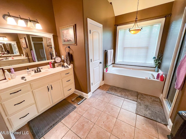 full bath with a bath, tile patterned flooring, a stall shower, vanity, and lofted ceiling