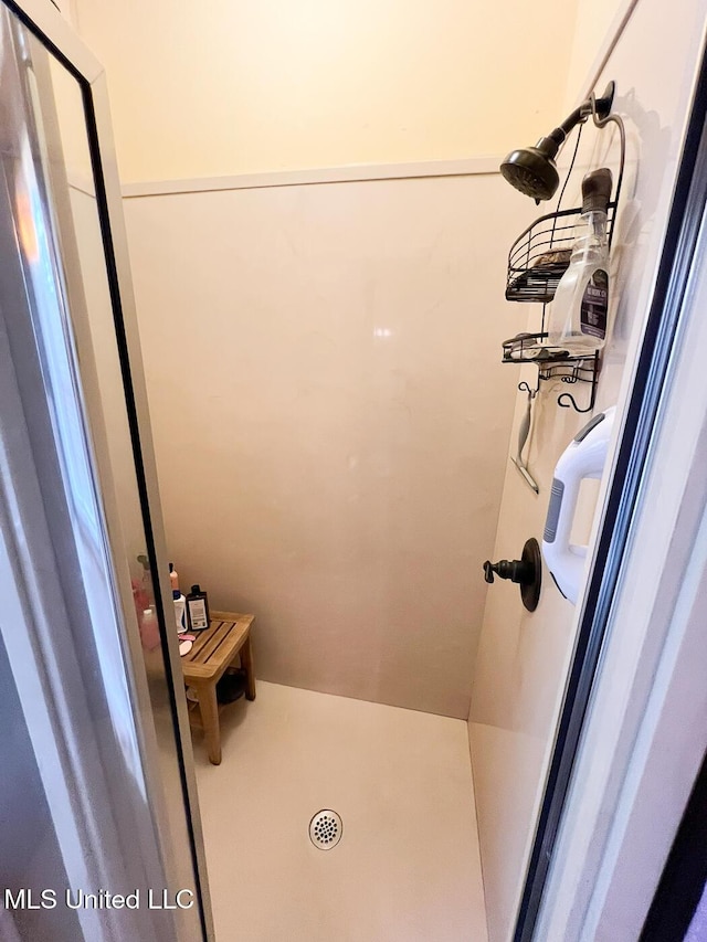 bathroom featuring walk in shower