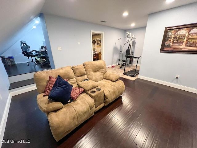 living room featuring wood-type flooring, visible vents, lofted ceiling, baseboards, and recessed lighting