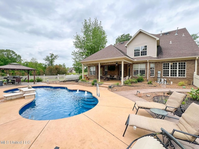 view of pool featuring a gazebo, a fenced in pool, a fenced backyard, and a patio area