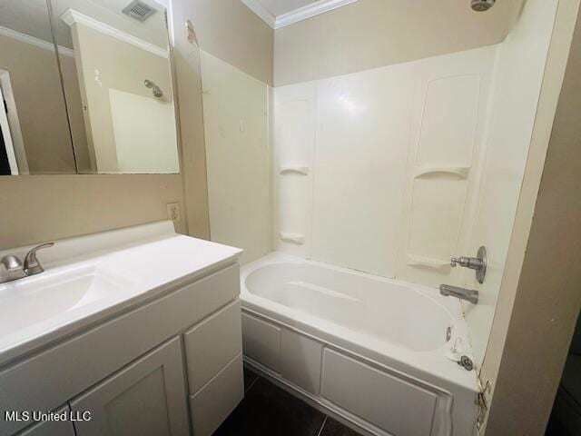 1561 Section Line Rd, Picayune, MS 39466 - bathroom with crown molding, vanity, and  shower combination