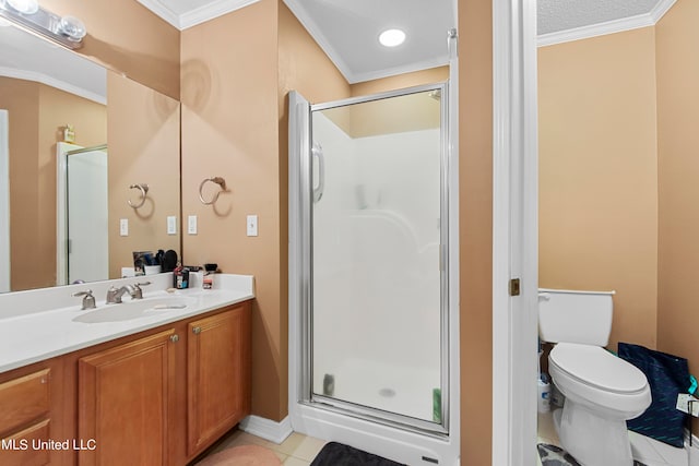 bathroom with walk in shower, toilet, vanity, crown molding, and tile patterned flooring