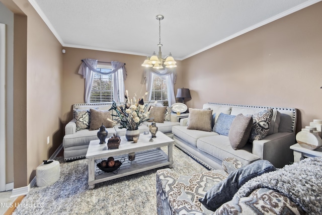 living area with baseboards, a notable chandelier, and crown molding
