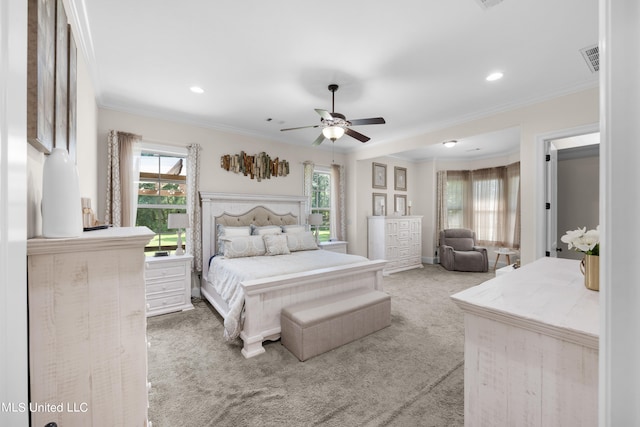 bedroom featuring crown molding, carpet flooring, and ceiling fan