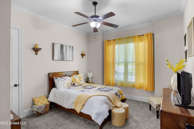 bedroom with ornamental molding, carpet, and ceiling fan