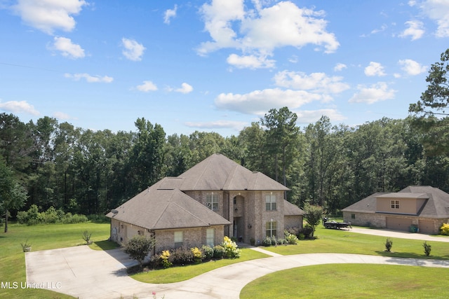 view of front of home with a front lawn